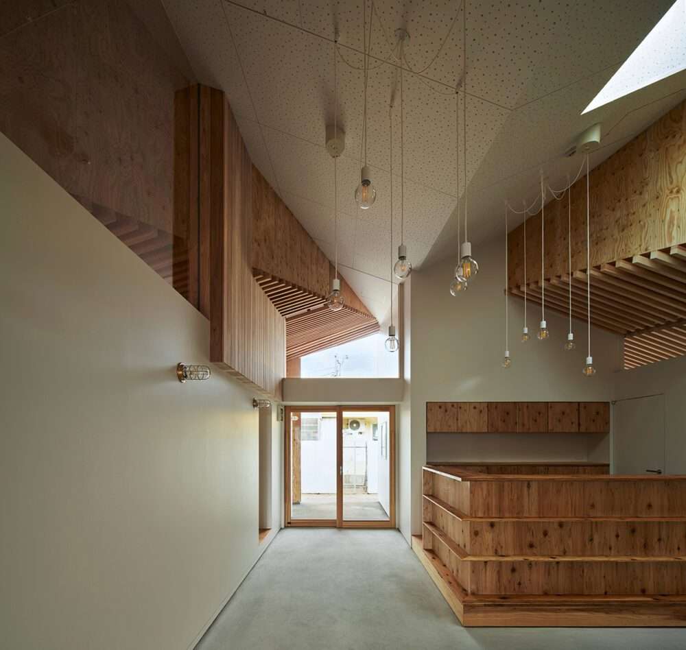 Nursery design with herringbone ceiling and wooden beams