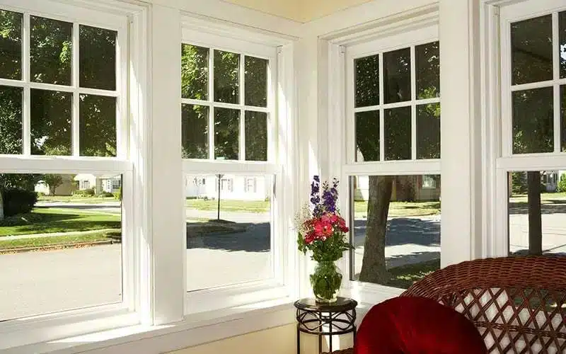 "Composite windows providing thermal insulation and natural light in a living room."
