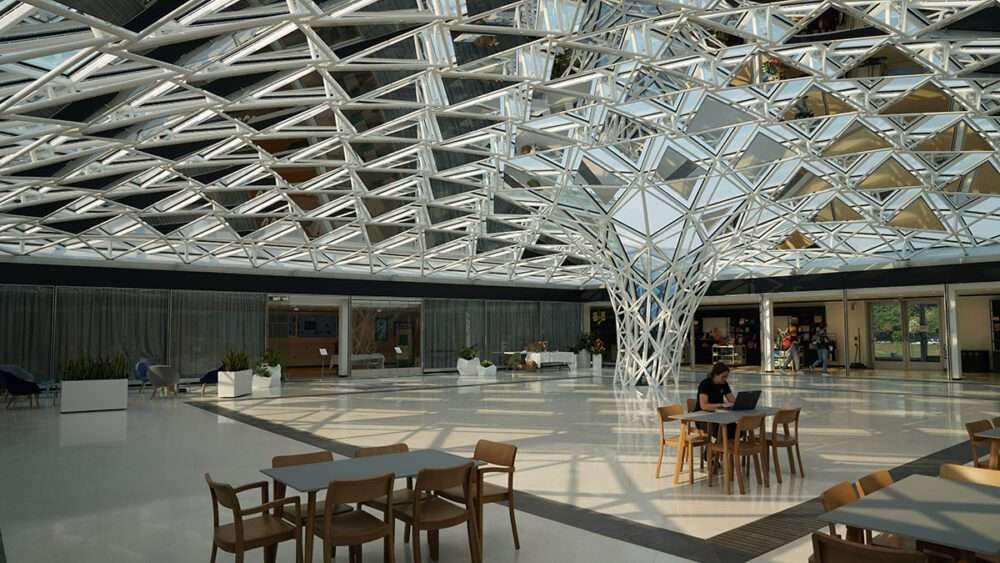 Addition of a glass canopy to the Buffalo AKG Museum's patio