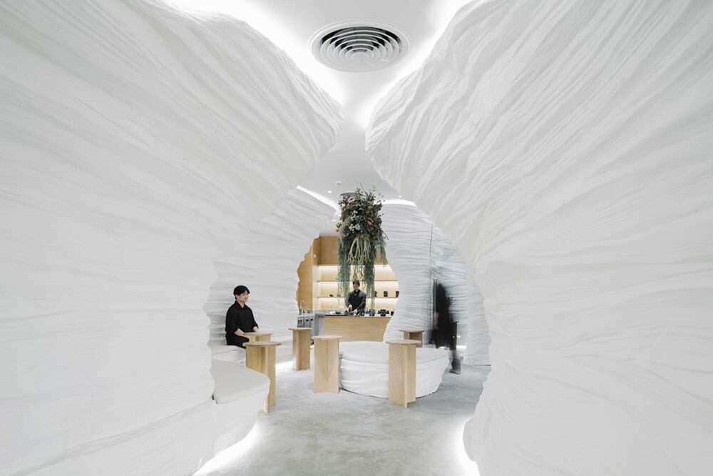 The design of the tea café within the cave-like walls has a surreal atmosphere