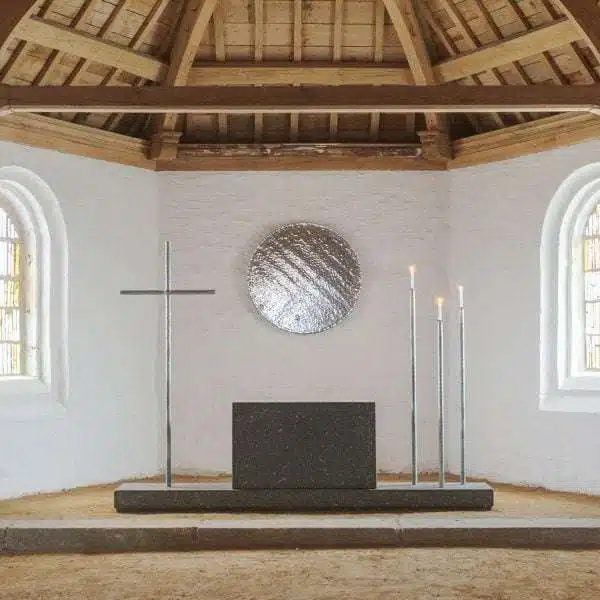 Ronan Bouroullec creates pared-back furnishings for 17th-century chapel in Brittany