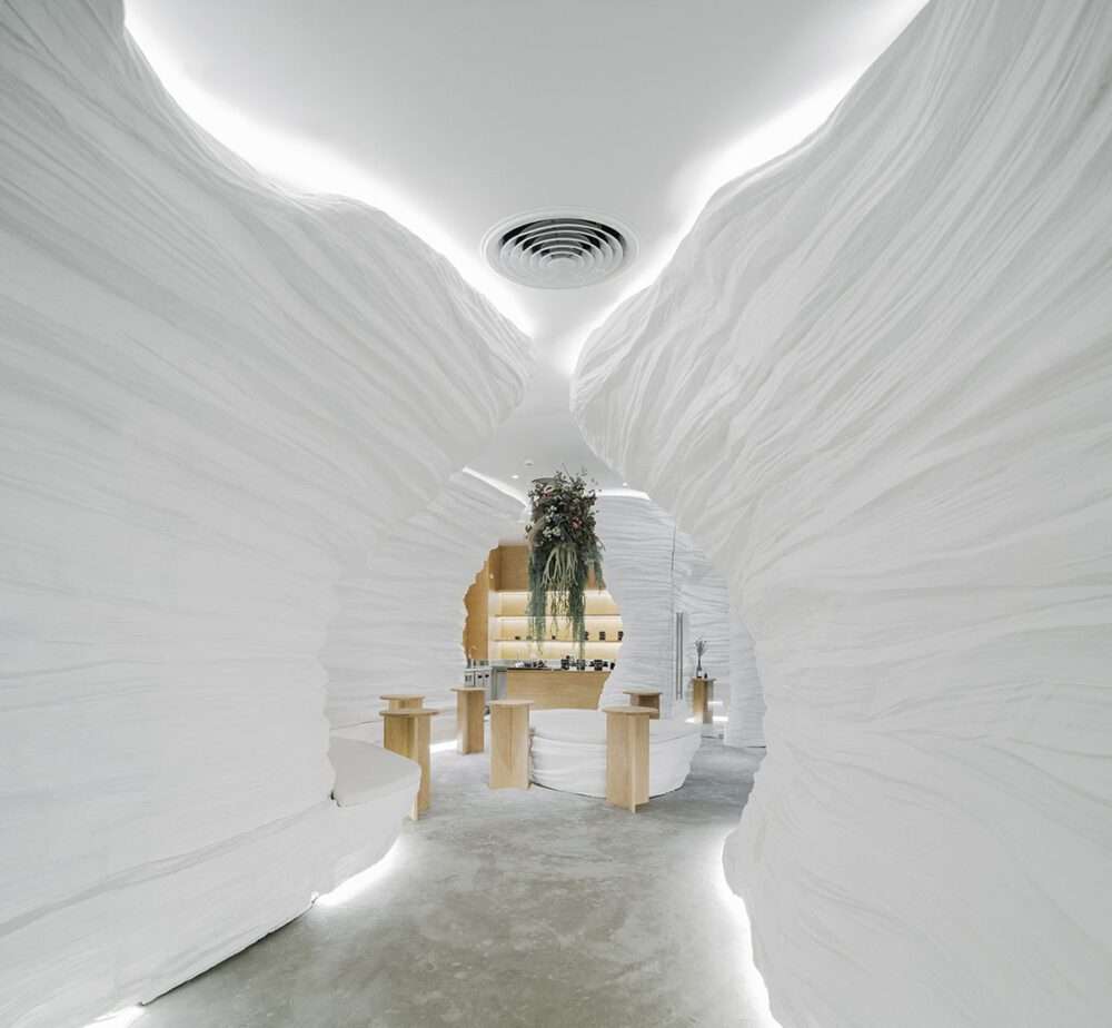 The design of the tea café within the cave-like walls has a surreal atmosphere