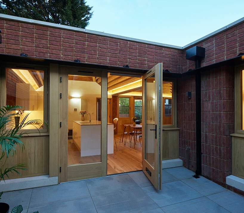 satish jassal architects crowns london bungalow with pyramidal ...