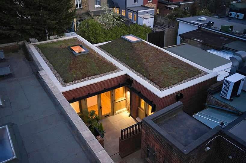 satish jassal architects crowns london bungalow with pyramidal skylights