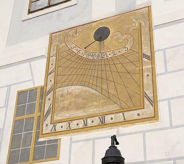 "A sundial on a building wall showcasing the connection between astrology and architecture"
