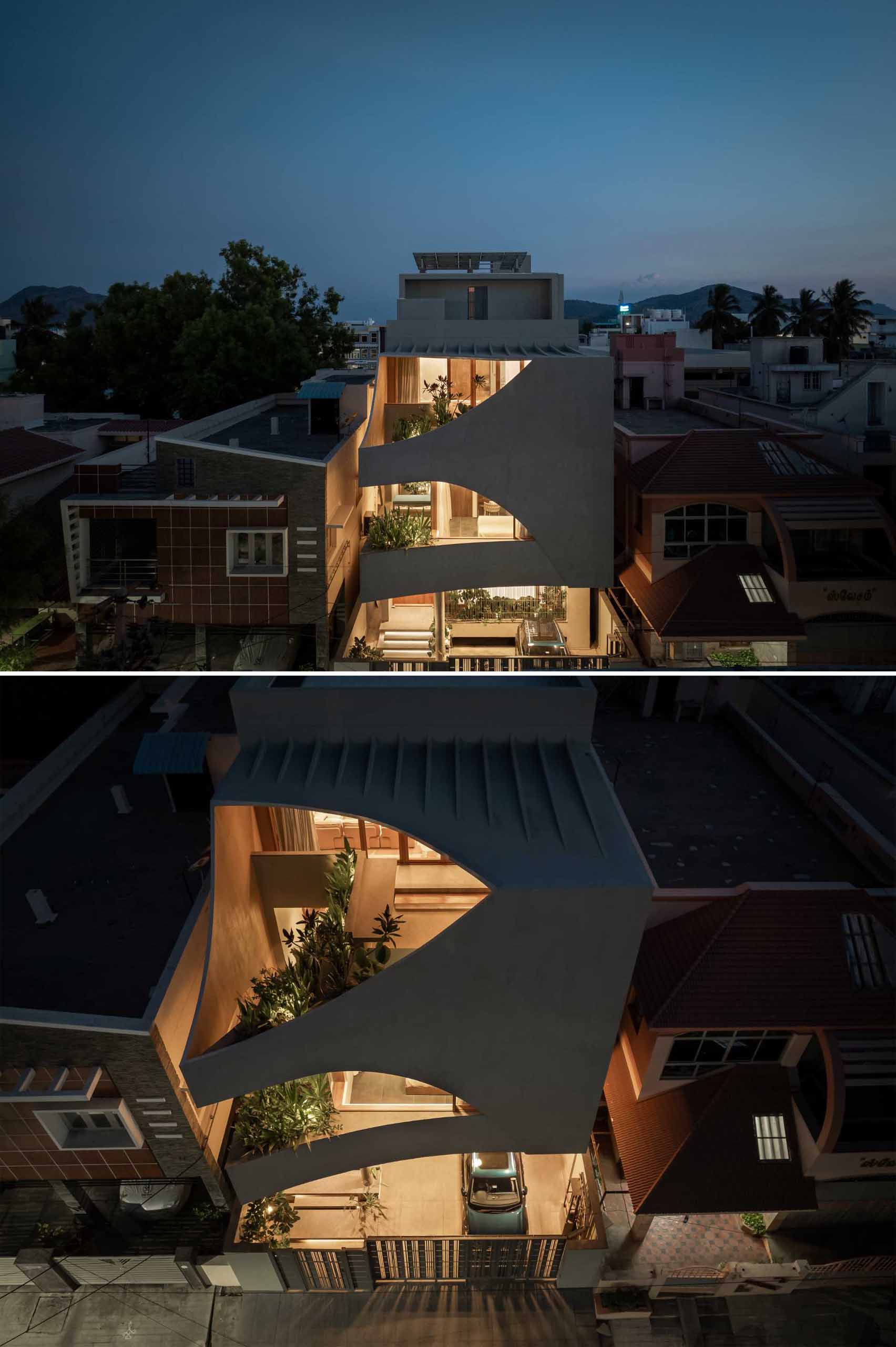 منزل عصري يتميز بتصميم مكعب مع أقسام مقطوعة.