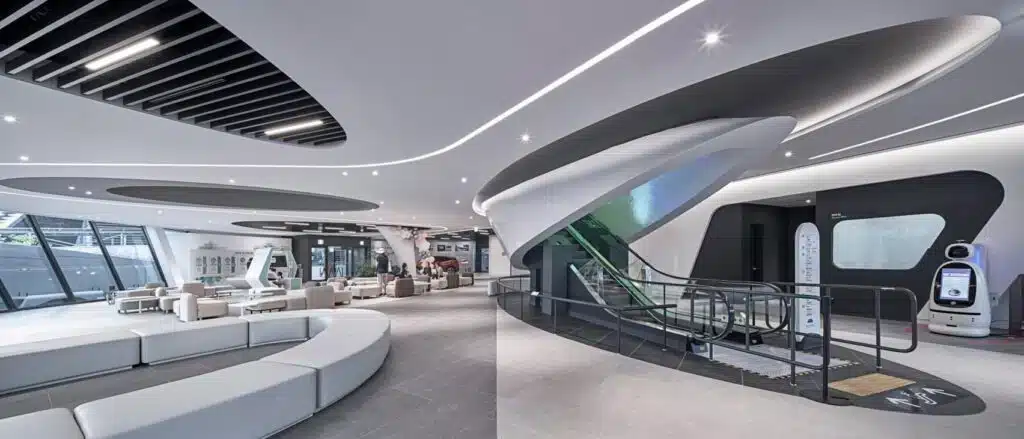 "Interior lobby of the Seoul Robot Museum, featuring a modern design with a reception robot and seating for visitors."