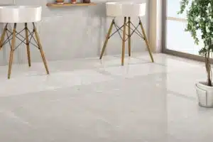 Modern room with large porcelain tiles and white sinks