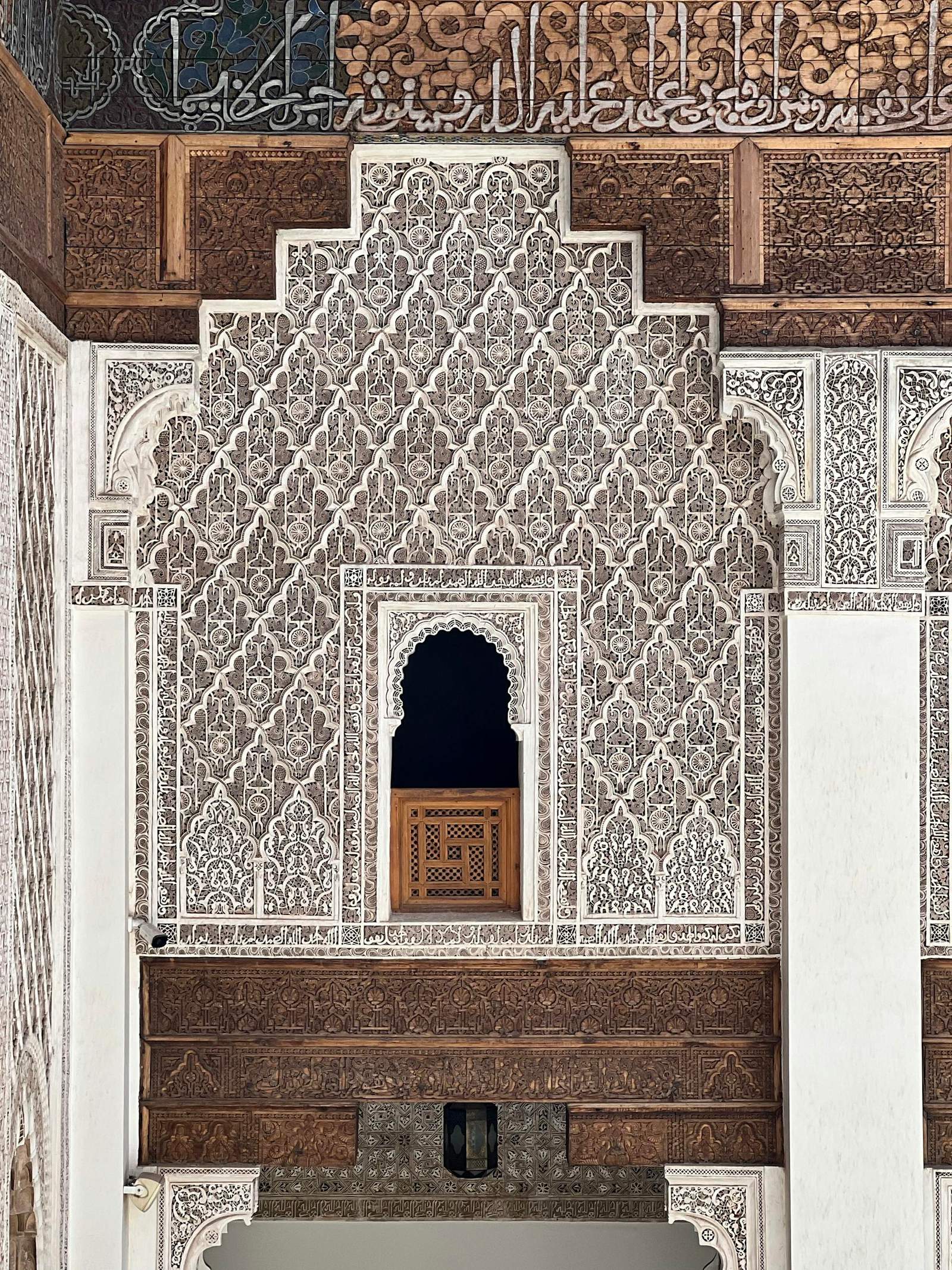 Explore ornate Moroccan architecture with detailed carvings and Islamic patterns.