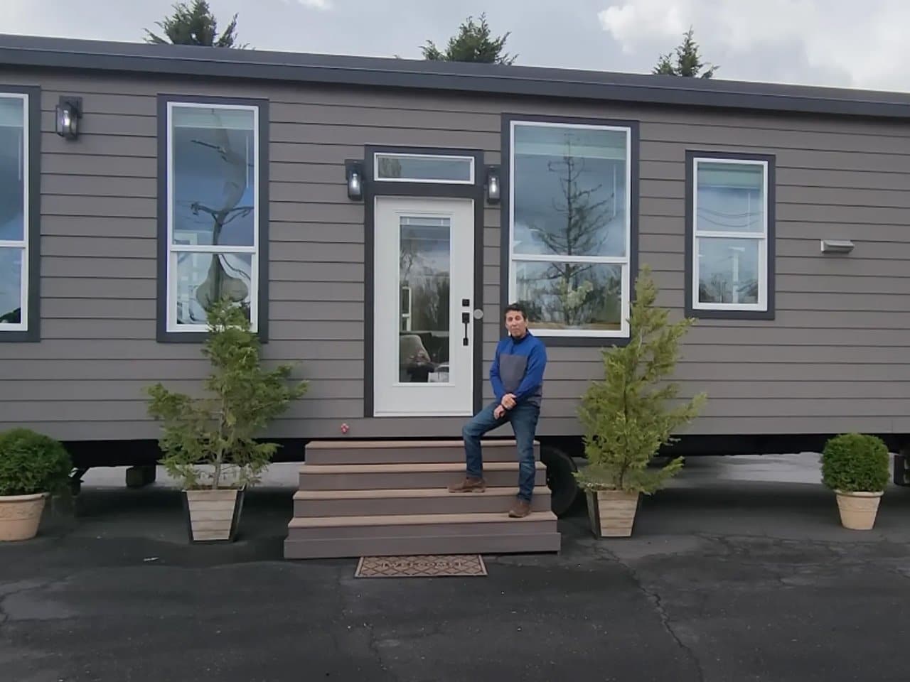 This Tiny Home Accommodates A Cozy Living Space On One Level With More Than One Bathroom