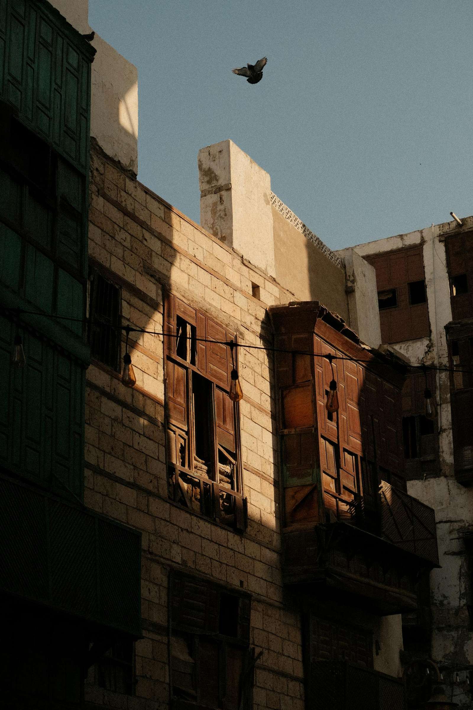 Beautiful historical buildings in Jeddah's old city with warm evening light.