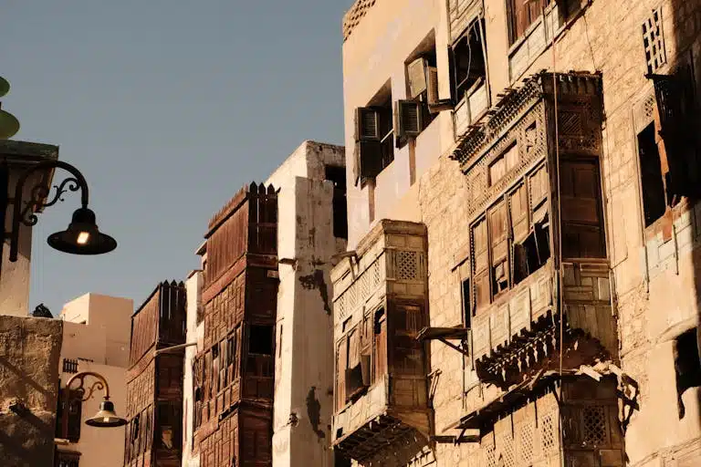 Sunlit traditional architecture in Al-Balad, Jeddah, showcasing historic charm and intricate design.