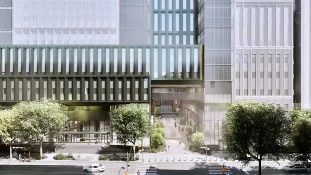 A conceptual rendering of the new Manhattan jail, showcasing its modern architectural design with a central passageway and green spaces.