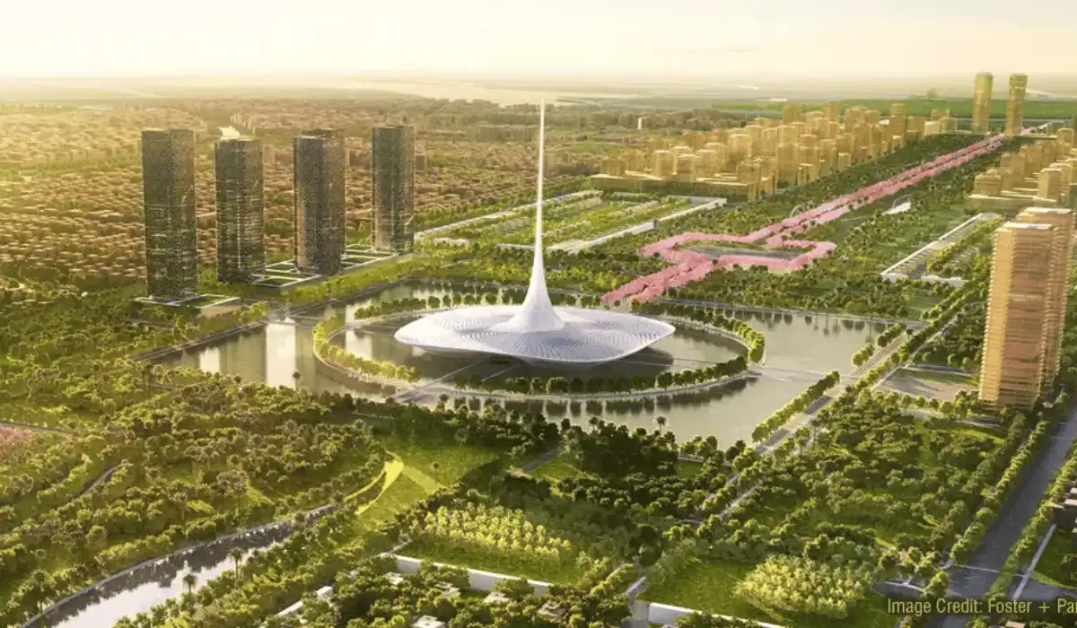 A modern architectural landmark in a green city