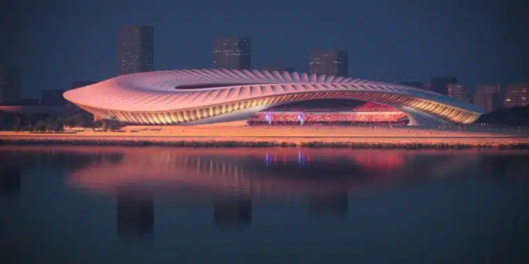 Nighttime view of Guangdong Stadium with futuristic architecture