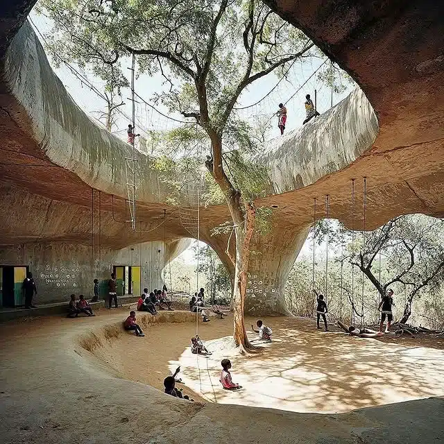 Students learning in a natural classroom integrated with trees and sustainable design in Kenya