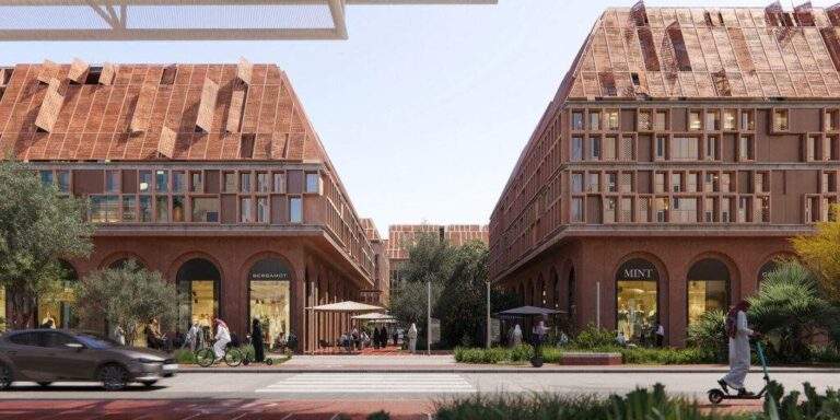 Two buildings in Expo City Dubai with a pedestrian path
