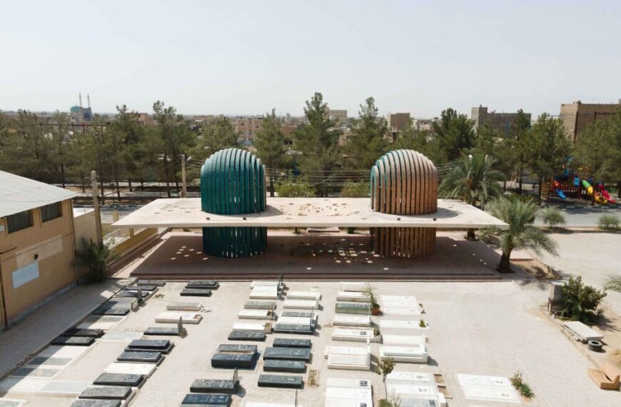 : "Aerial view of the Shafagh Tomb in Ardakan, Iran, featuring dual domes and open passageways that connect life and death."