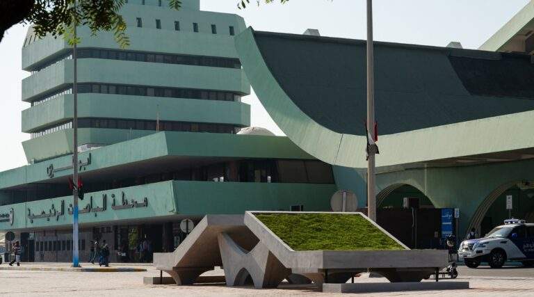 "The main bus terminal in Abu Dhabi, showcasing public art installations as part of the Public Art Abu Dhabi Biennial."