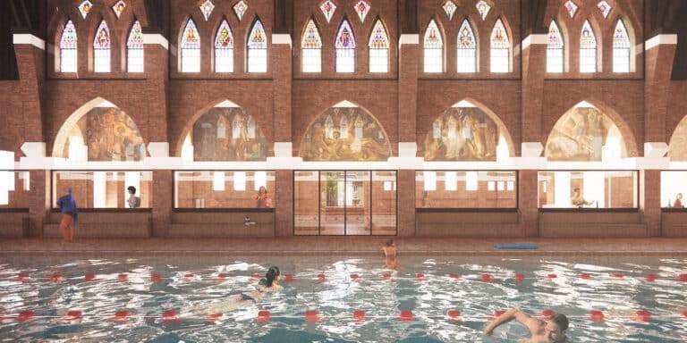 "A swimming pool inside a historic church, reflecting the original design with stained glass and arches, showcasing an innovative repurposing of sacred space."