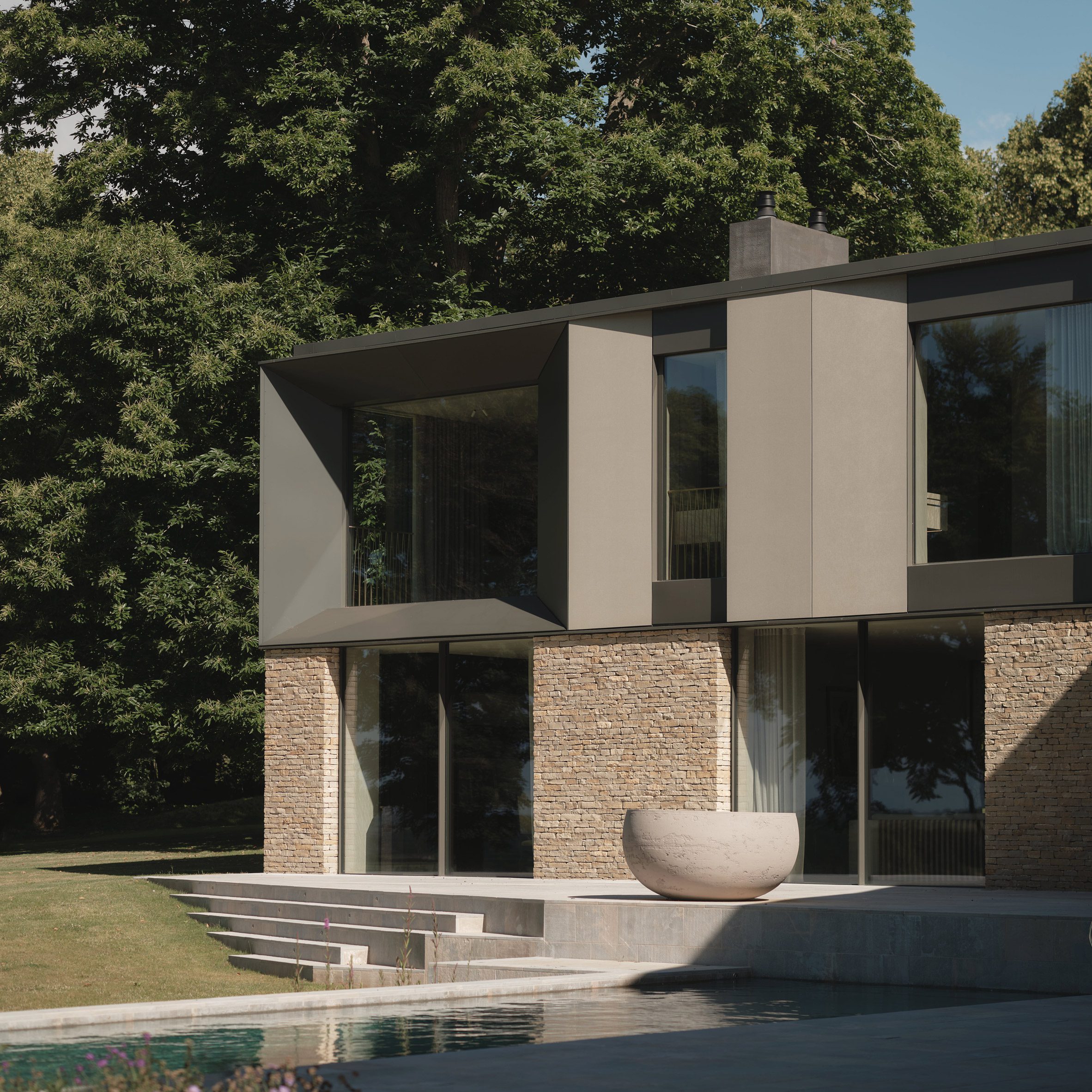 Interior of the house showcasing rough-textured walls and dark wood joinery