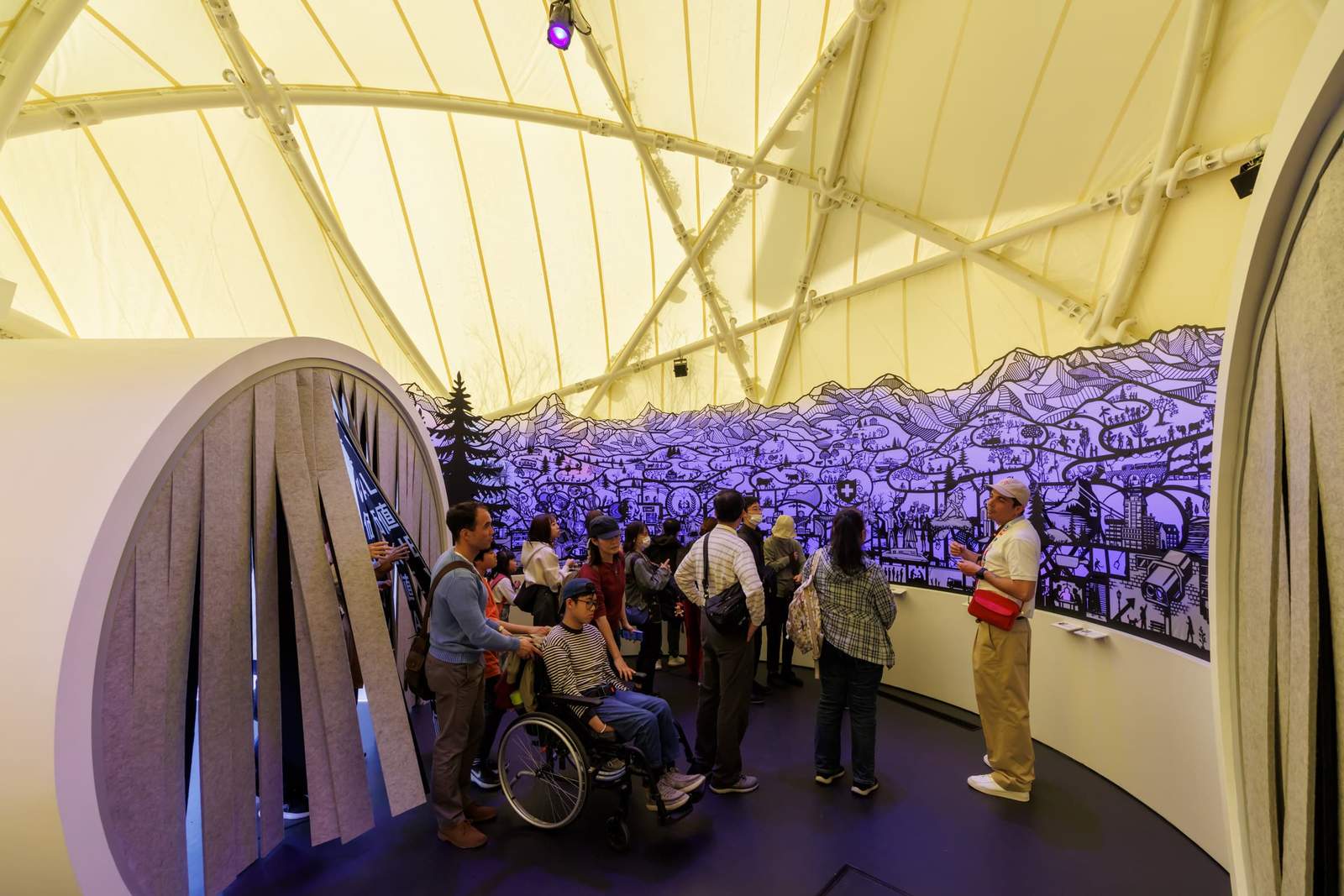 Exhibition space inside the Switzerland Pavilion at the 2025 Osaka Expo by Manuel Herz Architects.