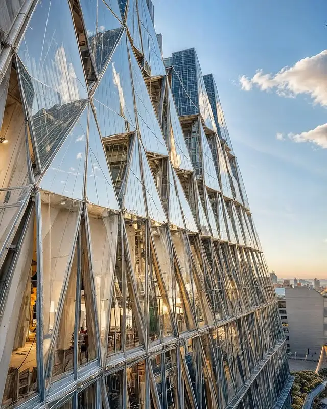 Civic sculpture in Guadalajara featuring crystalline glass and textile elements, inspired by origami art.