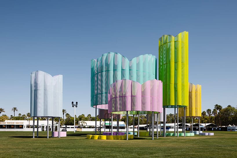 "Giant glowing flowers representing ephemeral art at Coachella."