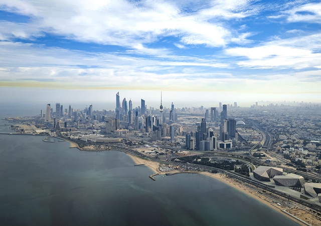 Aerial view of skyscrapers in Kuwait overlooking the sea