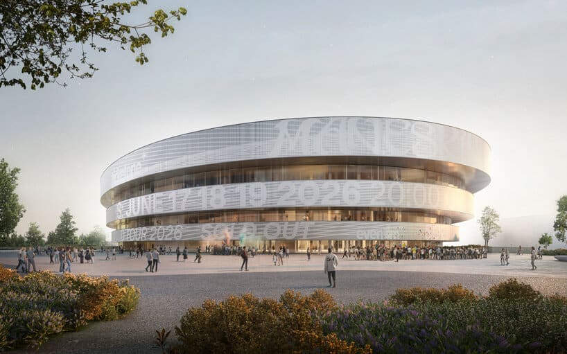 The modern Santa Giulia Arena, a 16,000-seat venue designed with eco-friendly features and illuminated metallic rings, showcasing Milan's preparations for the 2026 Winter Olympics.
