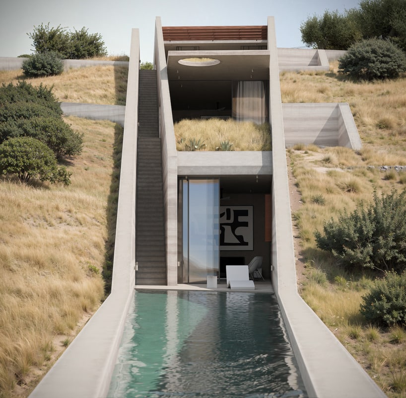 Aerial view of an underground house embedded in a natural hillside