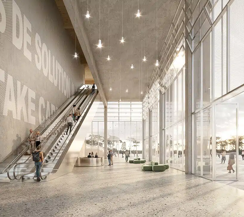 Spacious lobby with escalators and glass walls