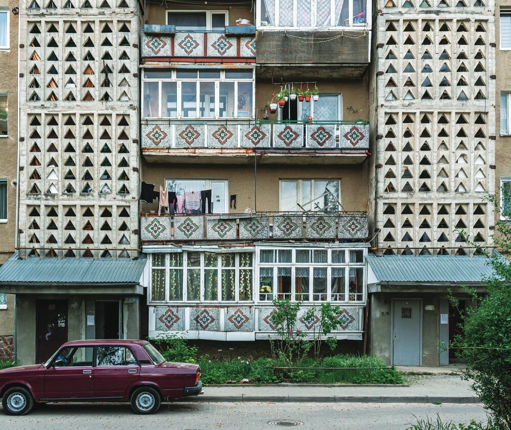 A residential building in Ukraine showcasing Soviet-era modernist design with geometric patterns and artistic details highlighting the beauty of Ukrainian architecture.