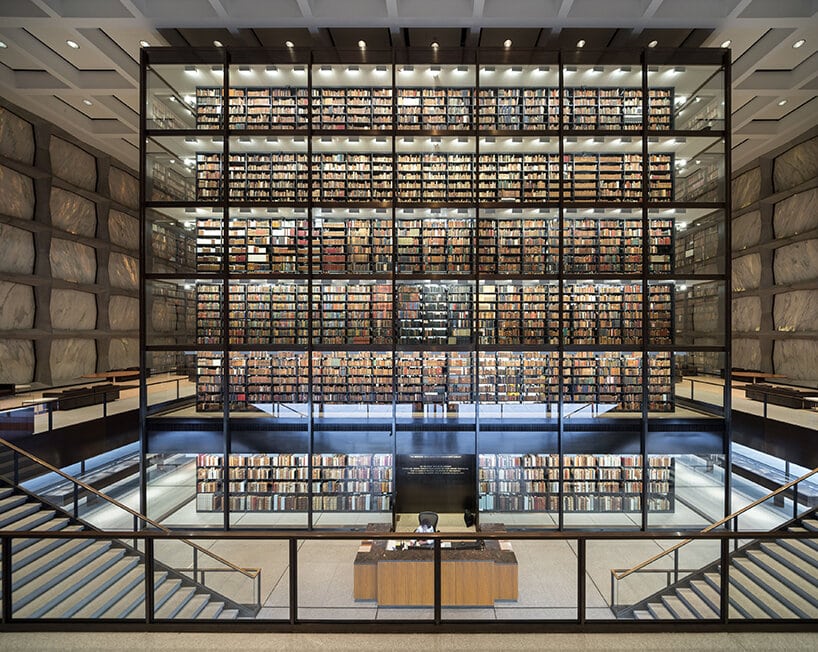 odern multi-story library in a photograph by Iwan Baan for the "Moments in Architecture" exhibition.