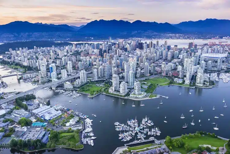 Vancouver skyline reflecting sustainable architecture with mountains