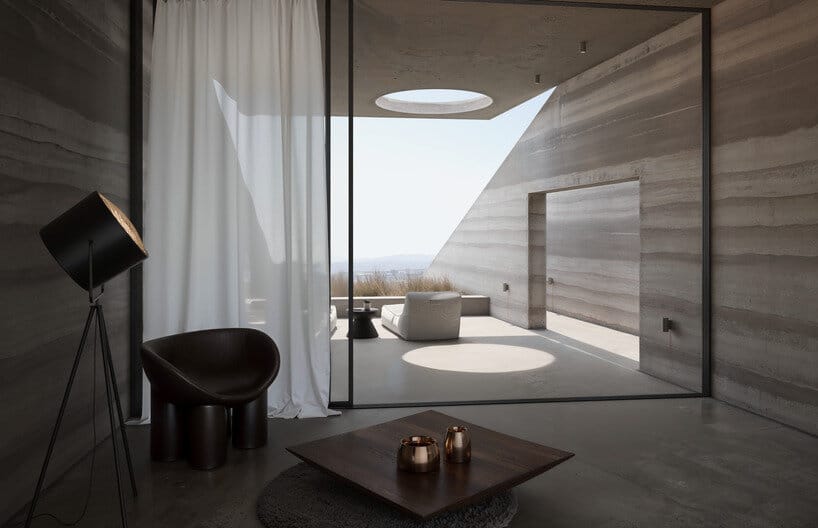 Outdoor seating area with geometric walls and panoramic view