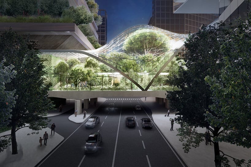 The Symbiosis District in Milan, featuring a modern pedestrian bridge with green spaces and eco-friendly design, promoting sustainable urban development.