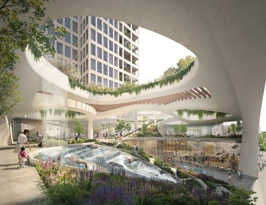 Multi-level urban space featuring waterfalls, greenery, and seating areas.