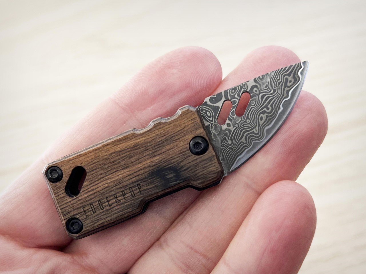 This  Damascus Steel + Ebony Wood EDC Micro-Knife Is As Unique As Your Fingerprint