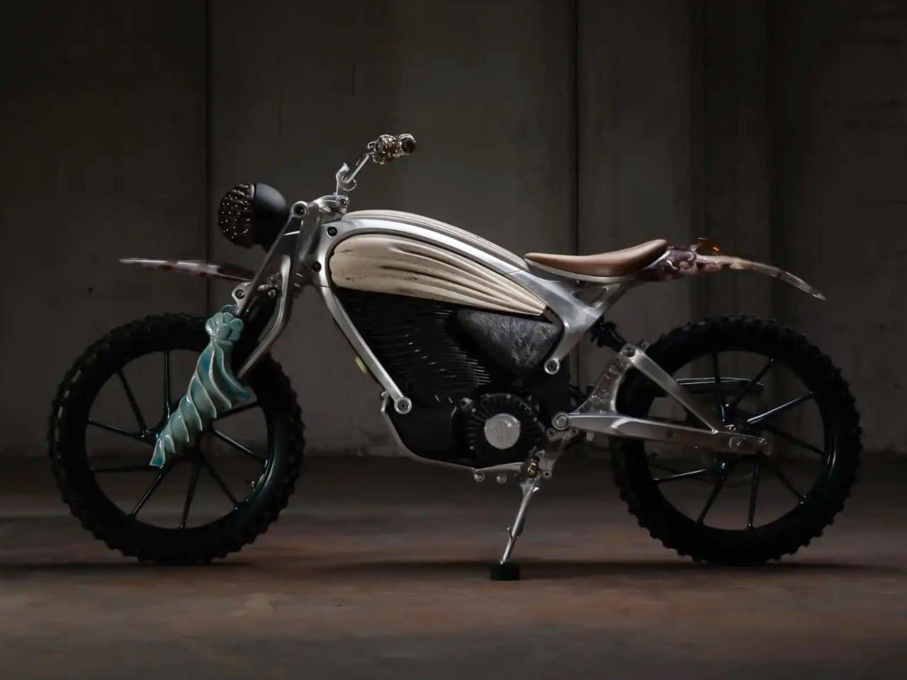 This Royal Enfield motorcycle wrapped in clay, resin, and stone redefines functional art