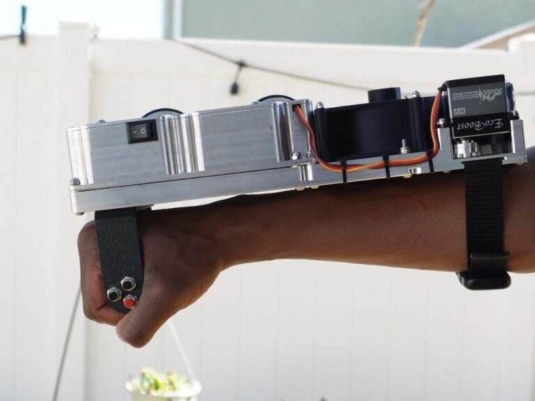 YouTuber builds wrist-mounted launcher that shoots 5 CDs per second at 33 mph