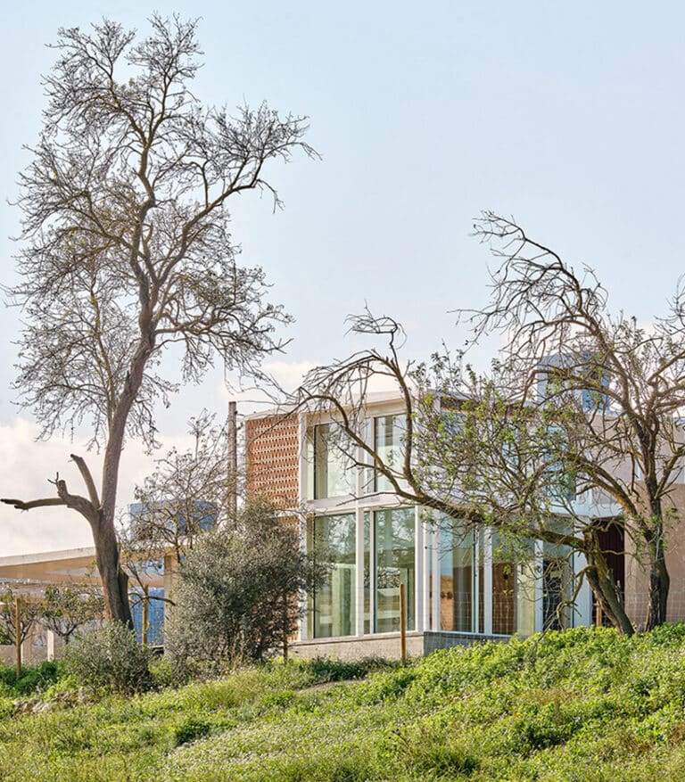 da.ch. crafts layered stone-paved landscape for casa tres patis in catalunya