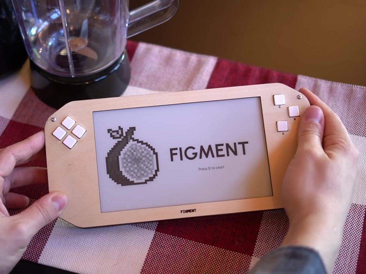 Figment portable device design with buttons for interactive gaming