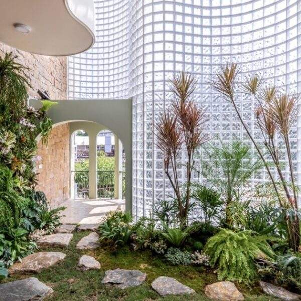 Curved Glass Brick Facade Defines DA VÀNG Studio’s Translucent House in Vietnam  