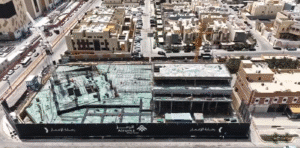 Construction site of the Alramz Office Tower in progress, showcasing the structural framework and surrounding urban development in Riyadh’s Al Malqa district