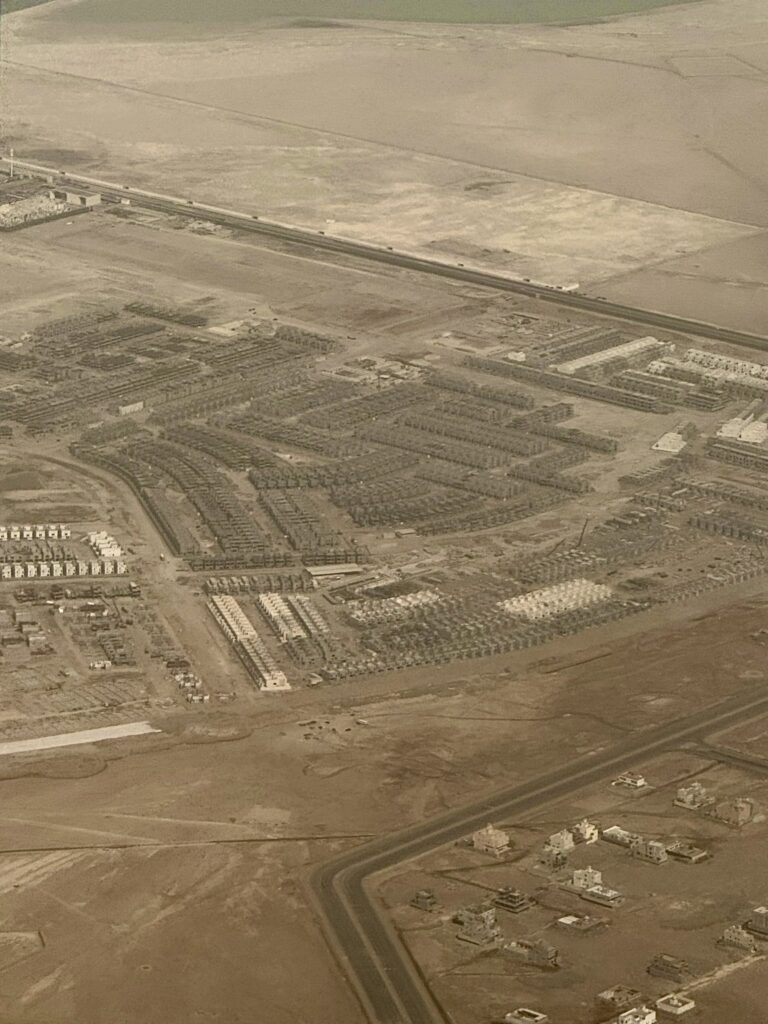 Aerial view showing progress at Sudaaim District as infrastructure and buildings begin to take shape