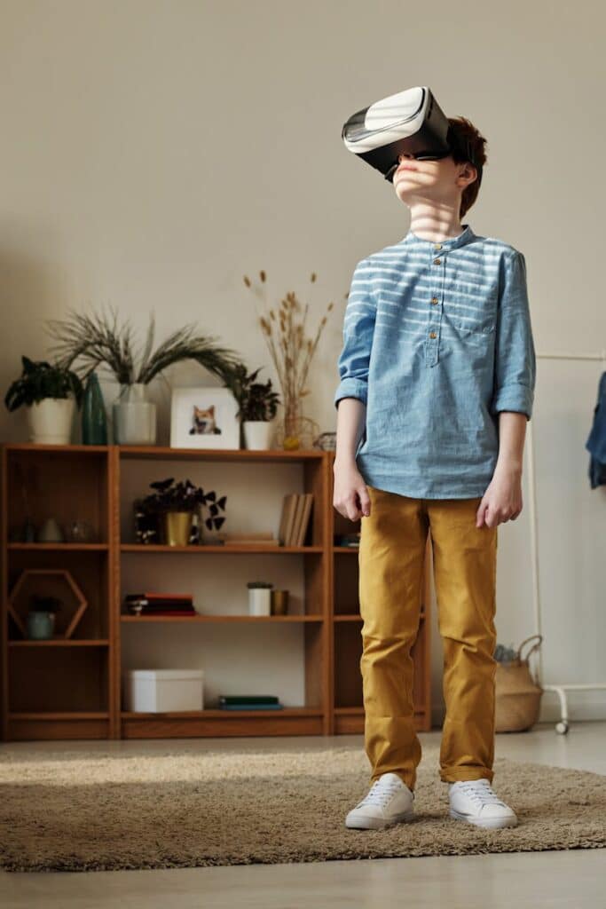 A person wearing a virtual reality headset in a softly lit room, focusing on the VR experience, showcasing the use of modern technology for education or entertainment.