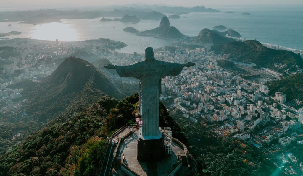 Christ the Redeemer statue overlooking Rio de Janeiro with a backdrop of Brazilian nature"