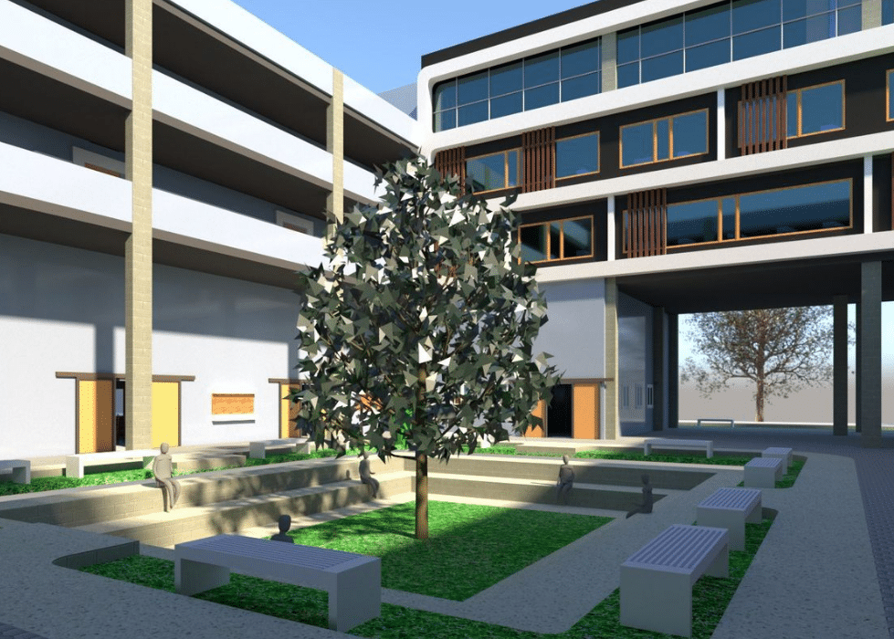 A modern indoor courtyard featuring trees and neatly arranged benches, creating a sense of comfort and organization.