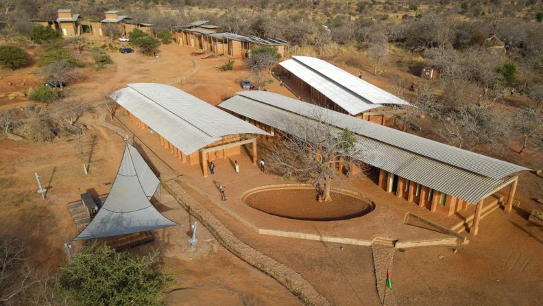 "Sustainable architectural design by Francis Kéré, utilizing local materials and the surrounding environment."